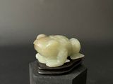 chinese carved jade turtle figurine on wooden stand