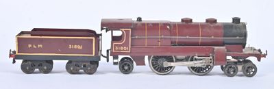 un petit train posé sur une surface blanche
