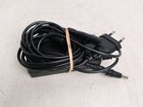 a picture of a black charger on a white surface