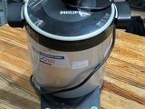 a small blender sitting on top of a wooden table