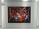 tableau représentant des fleurs rouges et blanches, dans un cadre argenté, accroché au mur