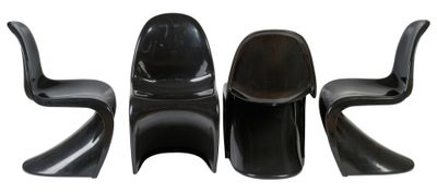 three black plastic chairs sitting next to each other on a white surface
