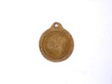 an image of a gold medal on a white background