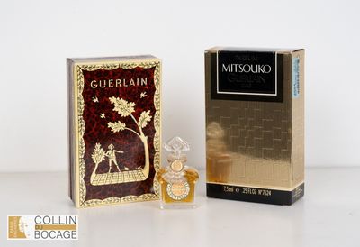 une photo d'un flacon de Guerlain à côté d'un coffret de parfum
