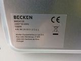 a close up of the back of a silver refrigerator