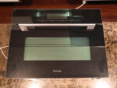 an image of a microwave built into a counter top