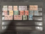 a lot of stamps on display in a display case