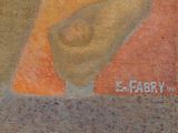 a painting on the wall of a building with a picture of a woman