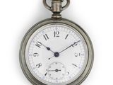 a silver pocket watch with roman numerals on the face