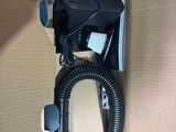 a box with a blow dryer and a hose in it