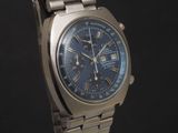 an image of a watch with a blue dial