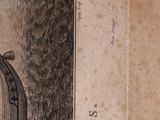 an old book with a drawing of a man in a cage