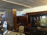 a room filled with furniture and a tv in it