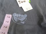 a picture of a t - shirt with a picture of a boat on it