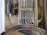 a box with silverware and utensils inside of it