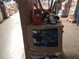 a cart that has some boxes on it in a warehouse