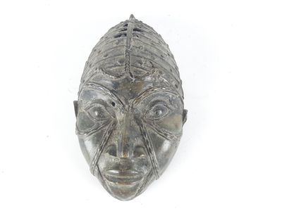 a close up of a sculpture of a person ' s face