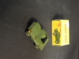 a toy gun and a box of matches on a table