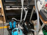 a picture of a vacuum and other tools in a room