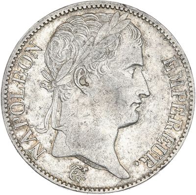 gros plan d'une pièce de monnaie sur laquelle figure une tête de femme