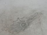 a broken glass object on the ground in the snow