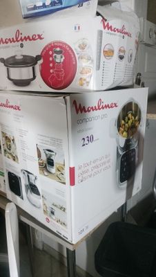 three boxes stacked on top of each other in a kitchen