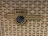 a close up of a purse with a key on it