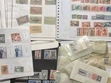 many different types of stamps on a table