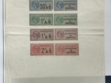 une image représentant une photo d'une feuille de papier sur laquelle figurent des timbres