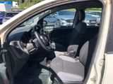 a car that has a baby seat in the back of it