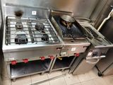 a stove with a frying pan on top of it