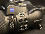 a close up of a camera on a black surface