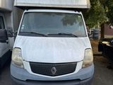 a white van that is parked in a parking lot
