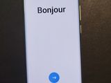 a close up of a phone with the text bonjou on it