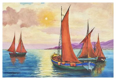 three boats that are floating in the water