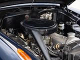 a close up of a car ' s engine with the hood open