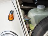 a close up of a car ' s engine with the hood open
