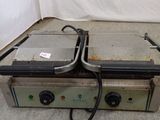 an image of a pair of fryers sitting on top of a counter