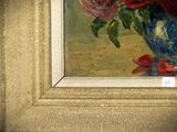 a painting of flowers in a blue vase on a table