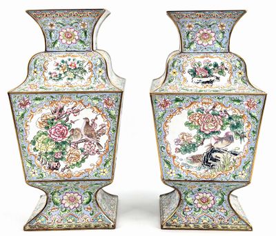 pair of chinese vases with birds and flowers painted on them