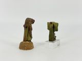 pair of bronze figurines of a man and a woman
