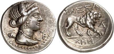 a silver coin with an image of a woman and a horse on it