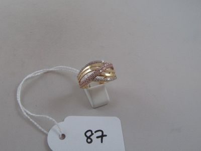 a ring that is on a string with a price tag on it
