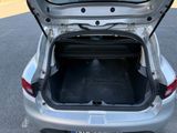 a car with its trunk open in a parking lot