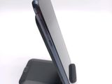 a close up of a cell phone on a stand