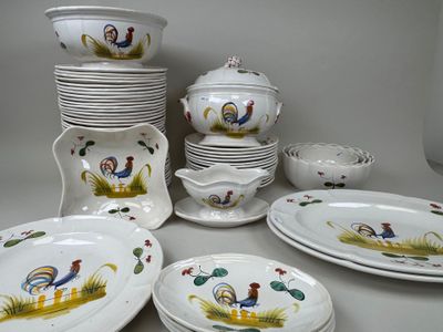 a lot of plates and bowls with roosters painted on them