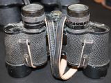 a pair of binoculars that are on a table