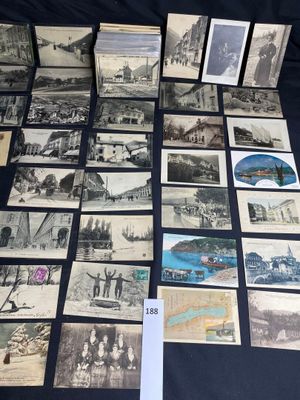 several old black and white photographs of people and buildings