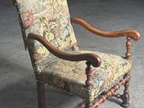 a chair with a floral upholstered upholstered upholstered upholstered upholstered upholstered upholstered
