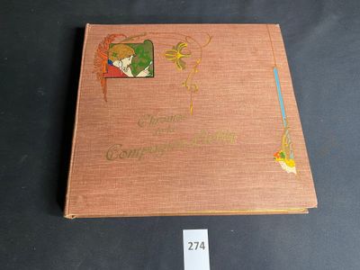 an old book with a picture of a woman and a bird on it